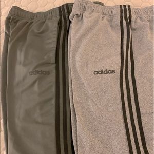 Two pair Adidas medium track pants like new condition